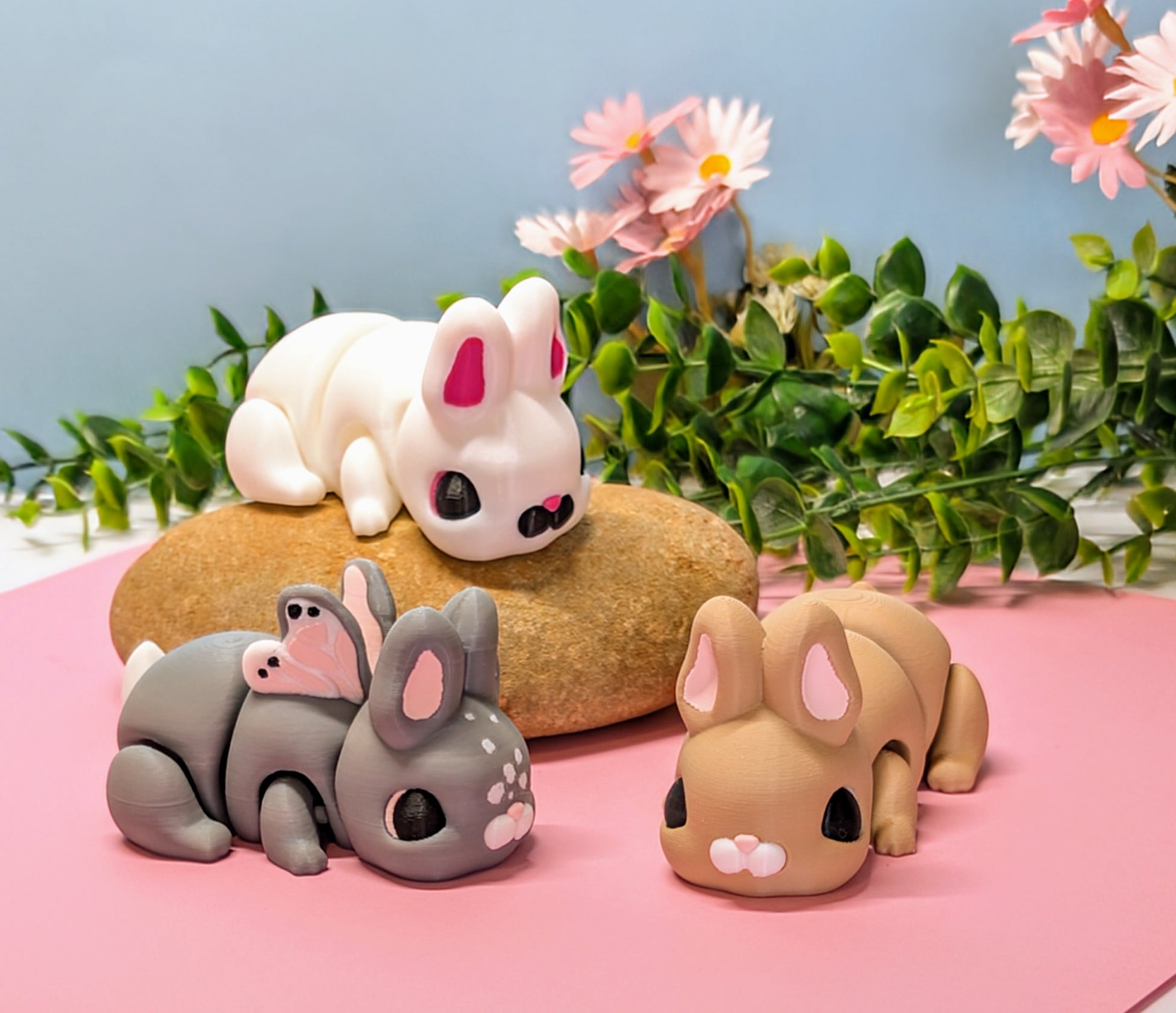 white, brown and butterfly 3d printed bunny rabbits