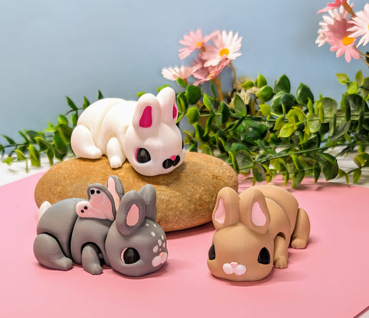 white, brown and butterfly 3d printed bunny rabbits