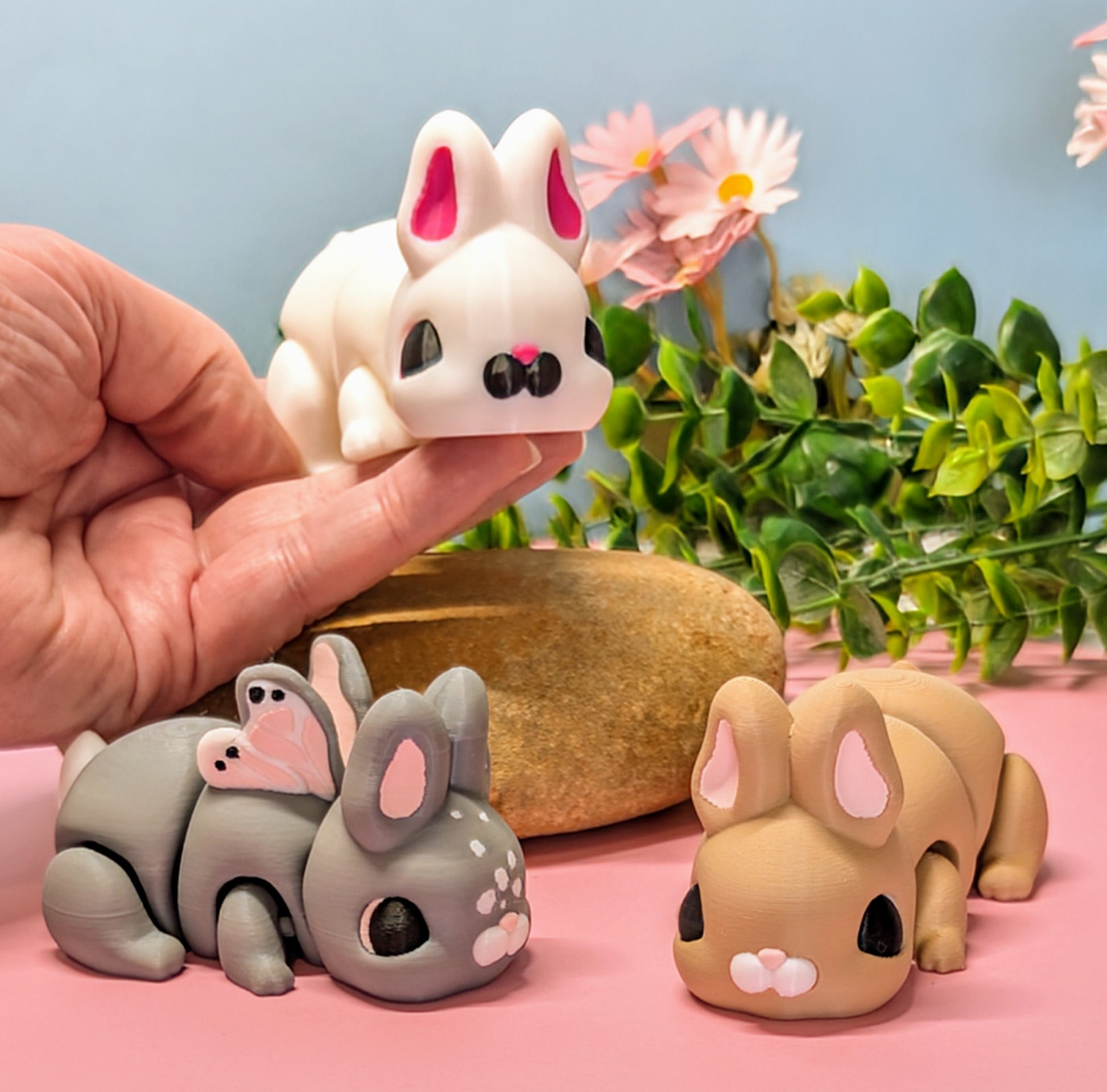 white, brown and butterfly 3d printed bunny rabbits
