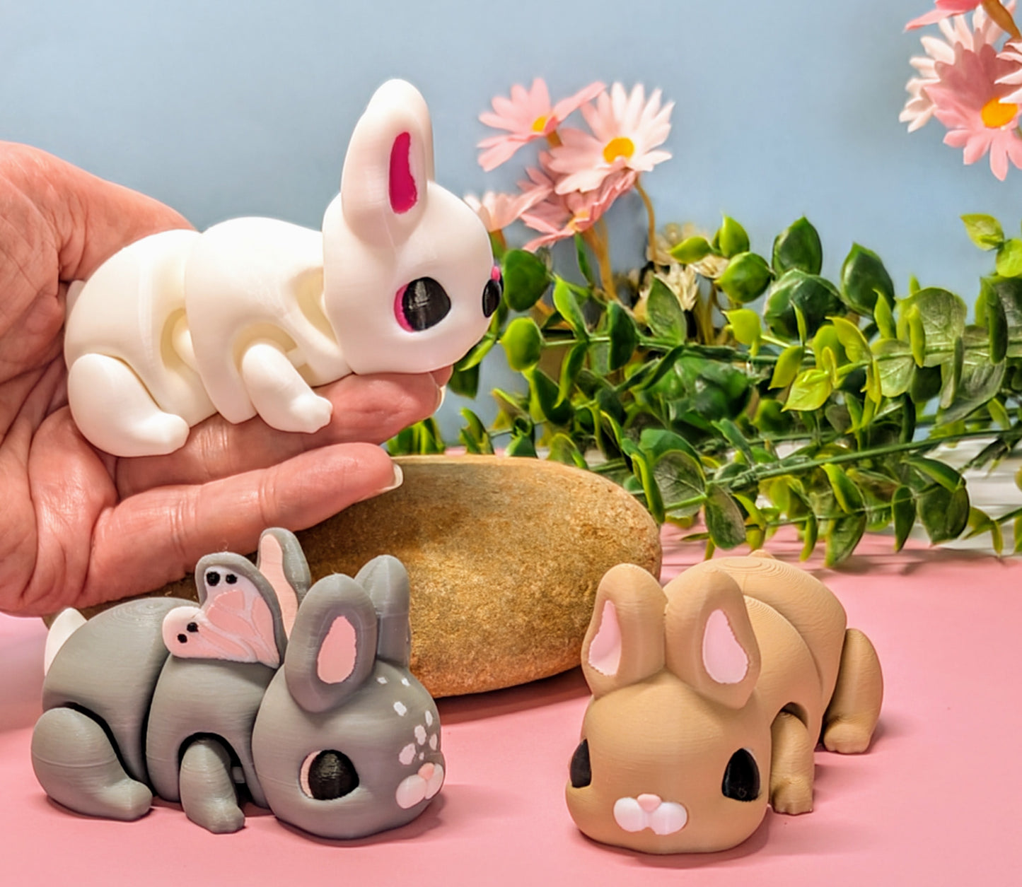white, brown and butterfly 3d printed bunny rabbits