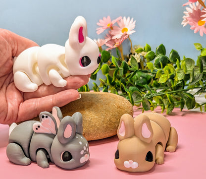 white, brown and butterfly 3d printed bunny rabbits