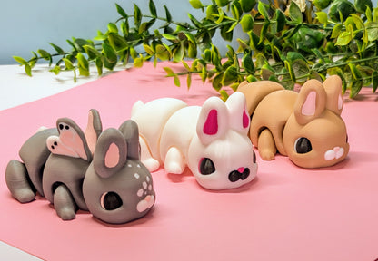 white, brown and butterfly 3d printed bunny rabbits